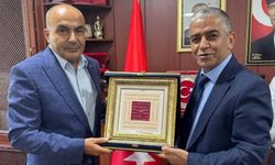 MHP’den İsmet Özcan’a ziyaret!